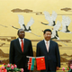 Kenyan President Uhuru Kenyatta (L ) and his Chinese counterpart Xi Jinping stand together during a signing ceremony at the Great Hall of the People in Beijing in 2013.